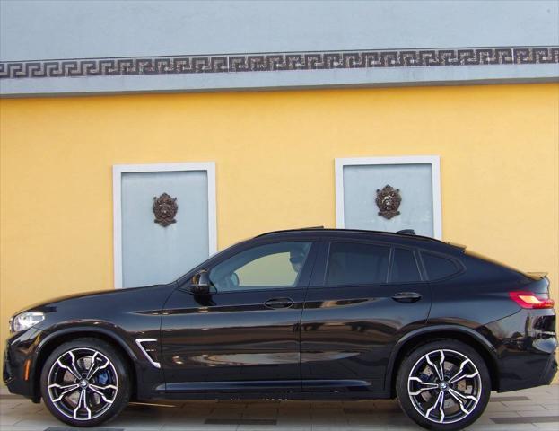 used 2021 BMW X4 M car, priced at $48,900