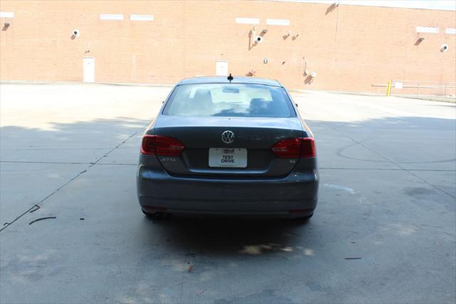 used 2014 Volkswagen Jetta car, priced at $7,490