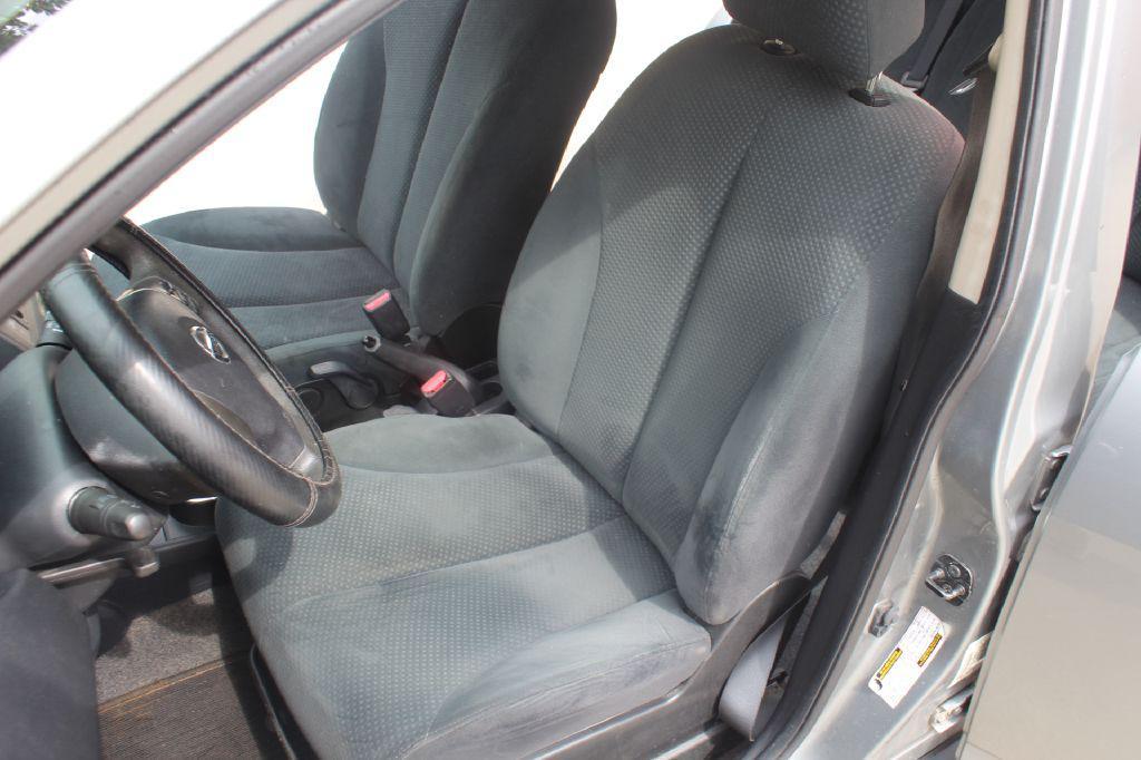 used 2010 Nissan Versa car, priced at $4,990