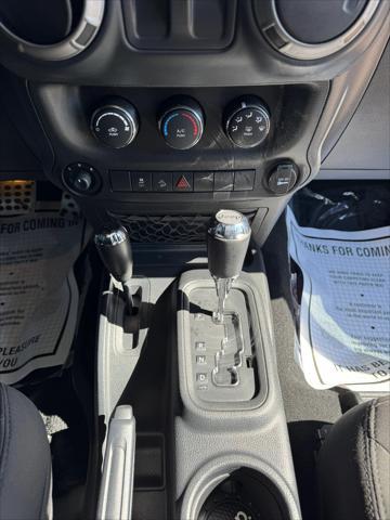 used 2015 Jeep Wrangler car, priced at $12,998