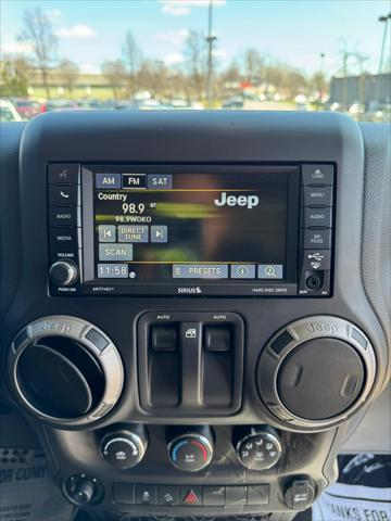 used 2015 Jeep Wrangler car, priced at $12,998