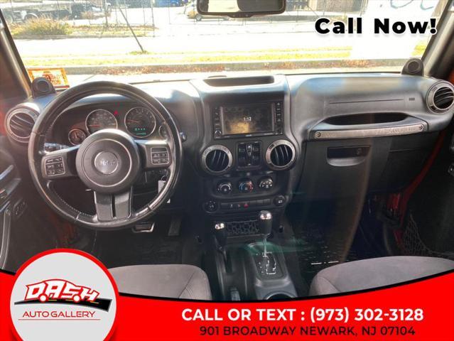 used 2014 Jeep Wrangler Unlimited car, priced at $13,599