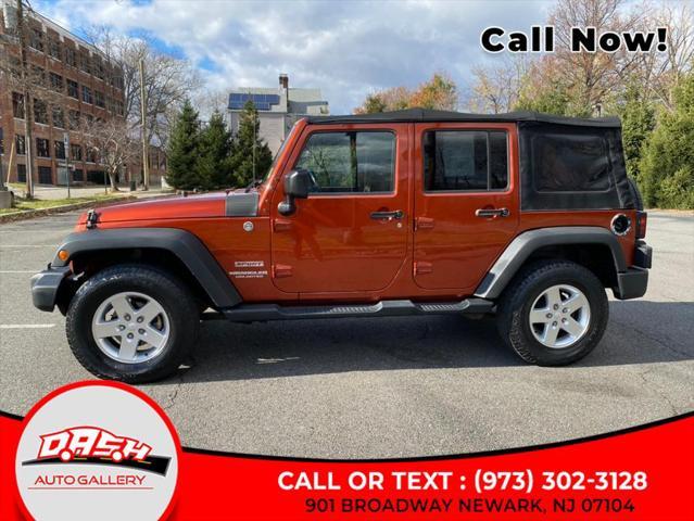 used 2014 Jeep Wrangler Unlimited car, priced at $13,599