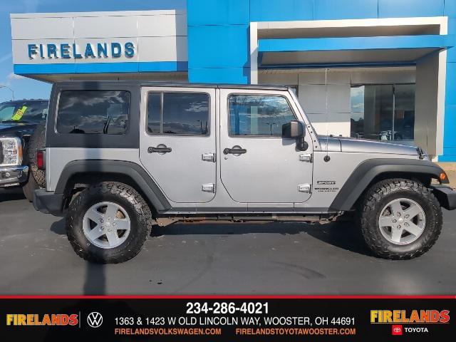 used 2014 Jeep Wrangler Unlimited car, priced at $14,250