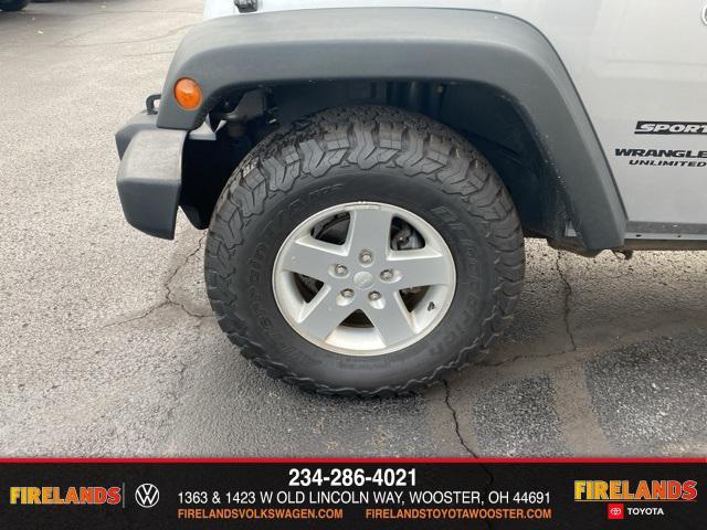 used 2014 Jeep Wrangler Unlimited car, priced at $13,859