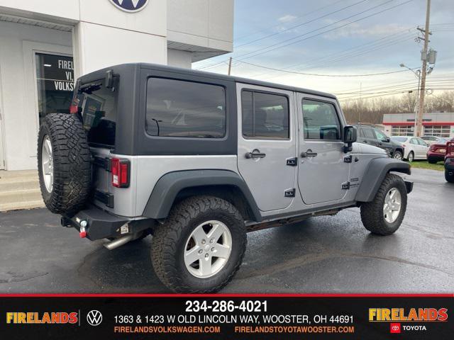 used 2014 Jeep Wrangler Unlimited car, priced at $13,859