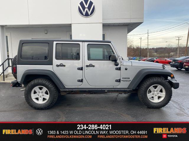 used 2014 Jeep Wrangler Unlimited car, priced at $13,859