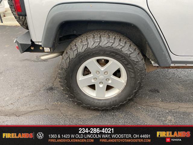 used 2014 Jeep Wrangler Unlimited car, priced at $13,859