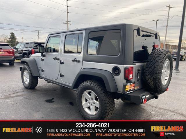 used 2014 Jeep Wrangler Unlimited car, priced at $13,859