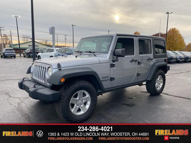used 2014 Jeep Wrangler Unlimited car, priced at $13,859