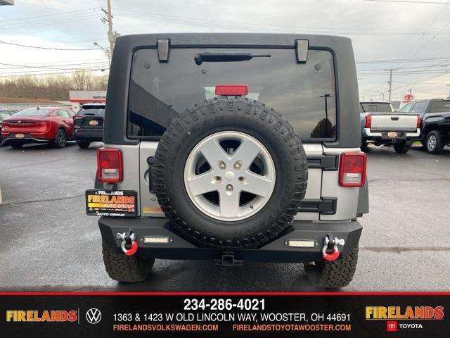 used 2014 Jeep Wrangler Unlimited car, priced at $13,859