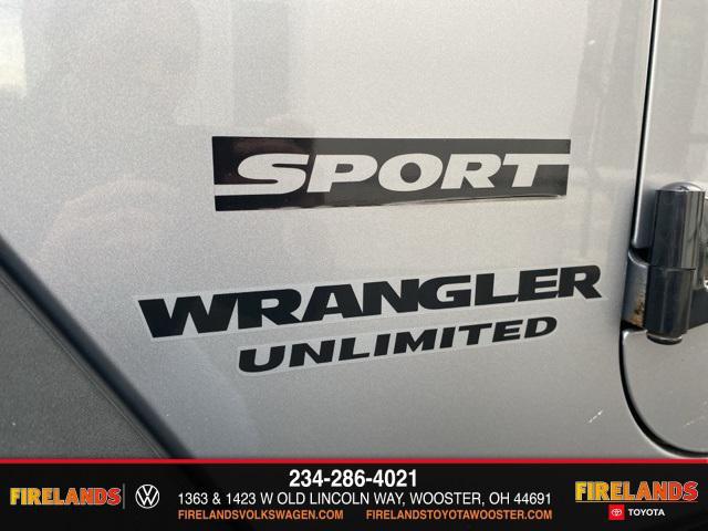 used 2014 Jeep Wrangler Unlimited car, priced at $13,859