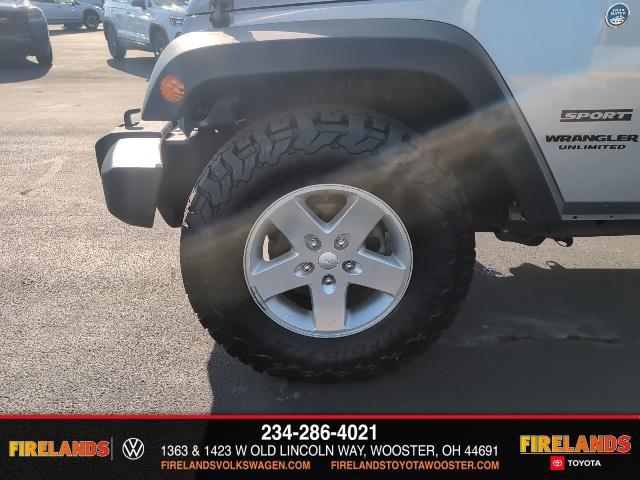 used 2014 Jeep Wrangler Unlimited car, priced at $14,250