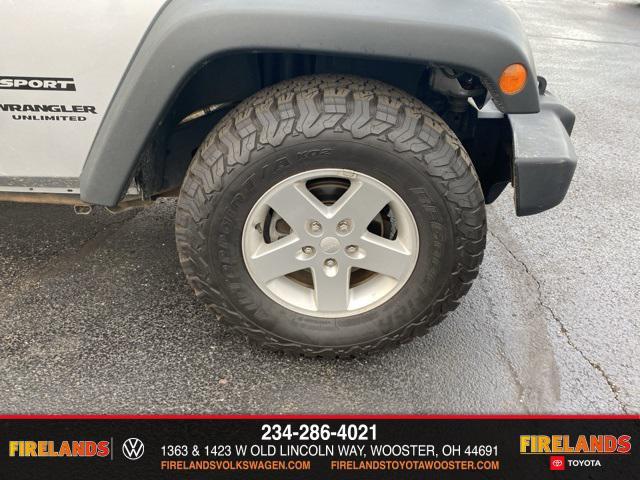 used 2014 Jeep Wrangler Unlimited car, priced at $13,859