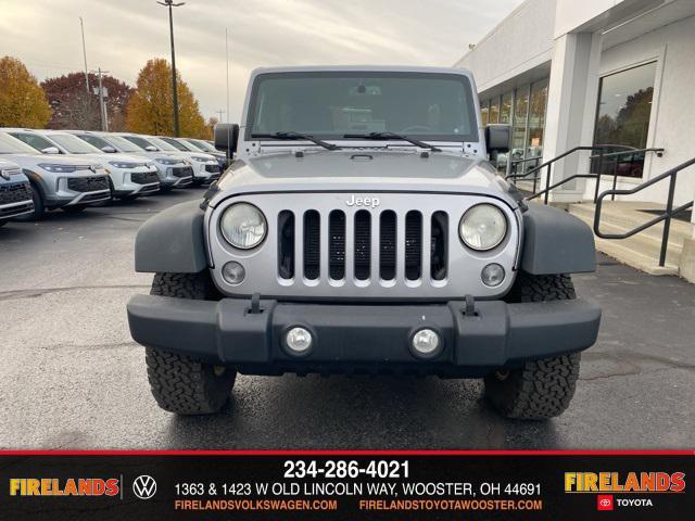 used 2014 Jeep Wrangler Unlimited car, priced at $13,859