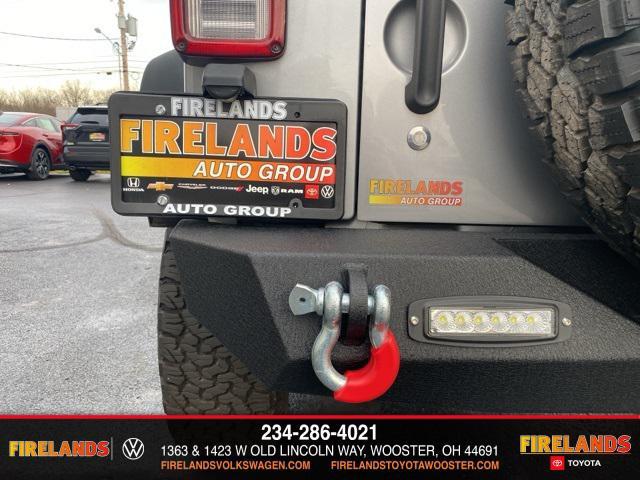 used 2014 Jeep Wrangler Unlimited car, priced at $13,859