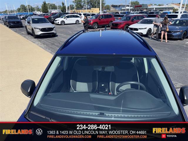 used 2022 Volkswagen Taos car, priced at $18,000
