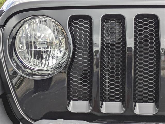 used 2023 Jeep Wrangler car, priced at $29,678