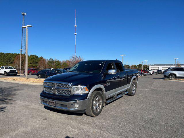 used 2015 Ram 1500 car, priced at $18,703